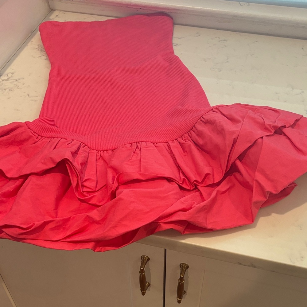 Charming Pink Dress tube top with ruffles on the bottom
Never been worn